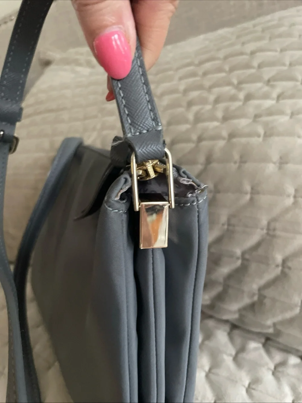 kate spade gray nylon crossbody with gold logo plaque